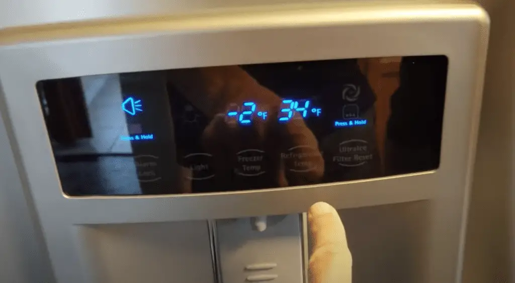 adjust temperature control settings on Kenmore freezer